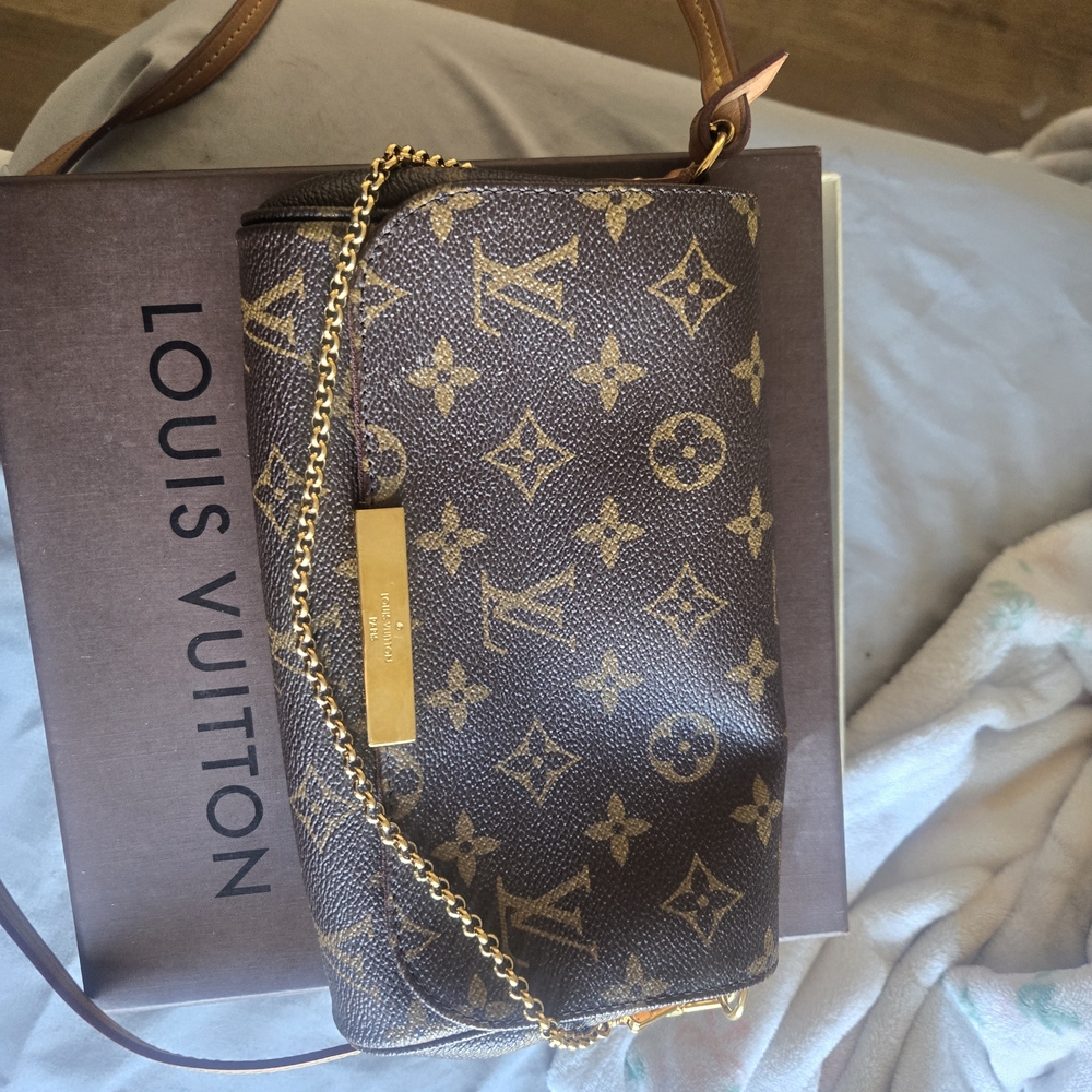 Louis Vuitton Monogram Clutch with Gold Accents